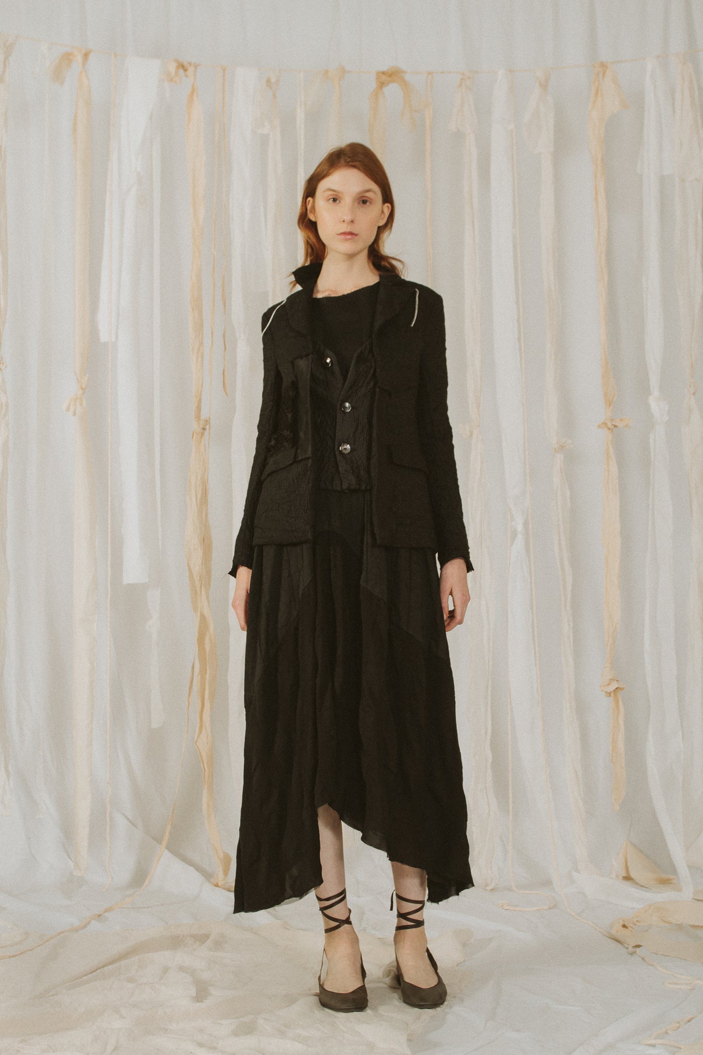A Tentative Atelier SS18 Lookbook Womens black crinkled jacket, waistcoat and dress