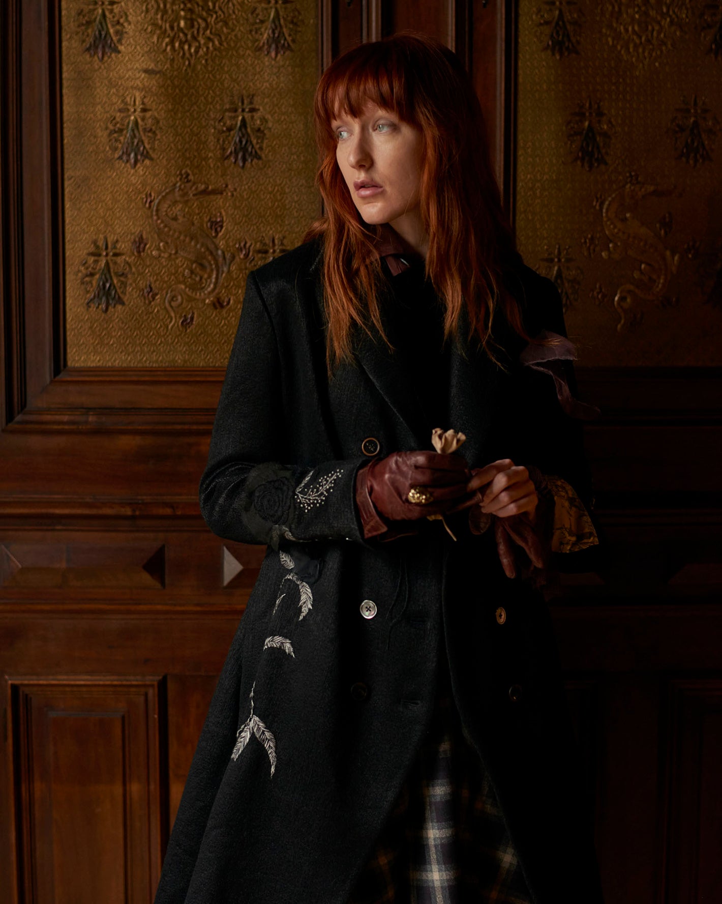 A Tentative Atelier AW20 Lookbook Womens crop of black embroidered coat and red leather gloves