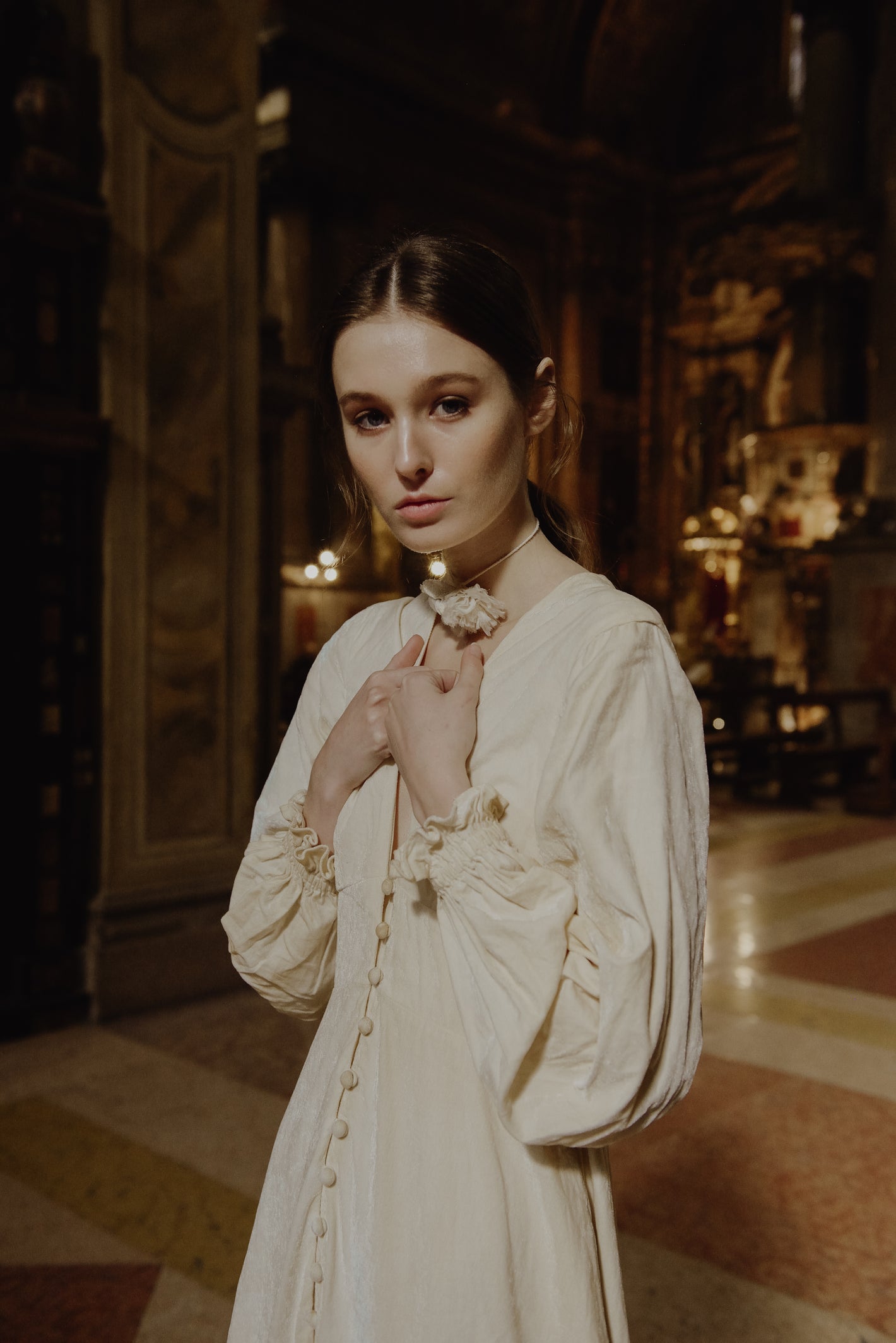 A Tentative Atelier AW19 Lookbook Womens crop of a white long sleeved dress with buttons and gathered cuffs 2