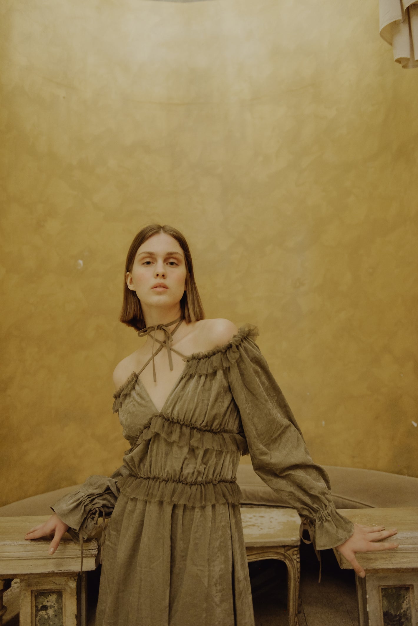 A Tentative Atelier AW19 Lookbook Womens crop of beige velvet off-shoulder halter tie long dress with ruffles