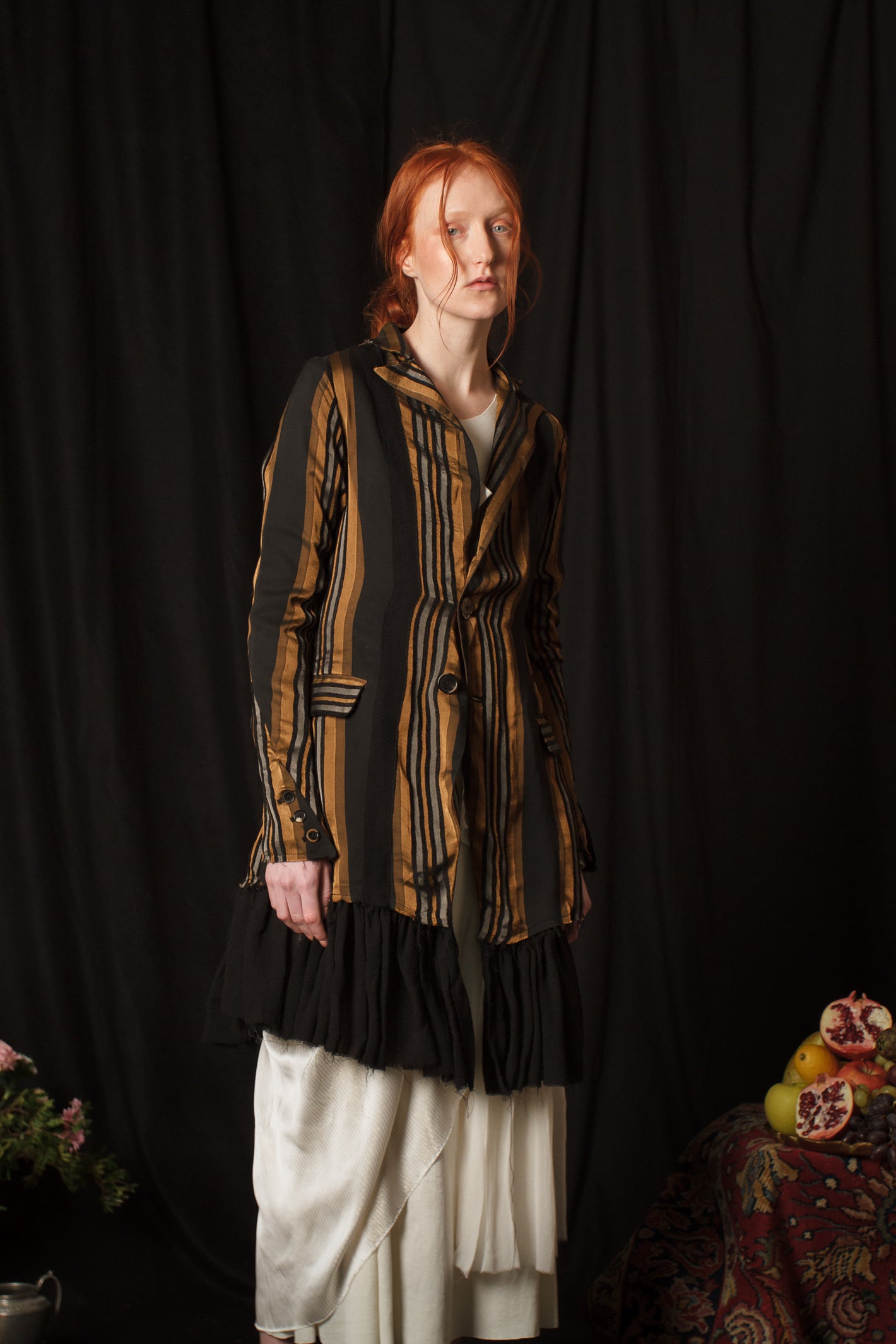 A Tentative Atelier AW18 Lookbook Womens crop of black, brown and silver striped jacket