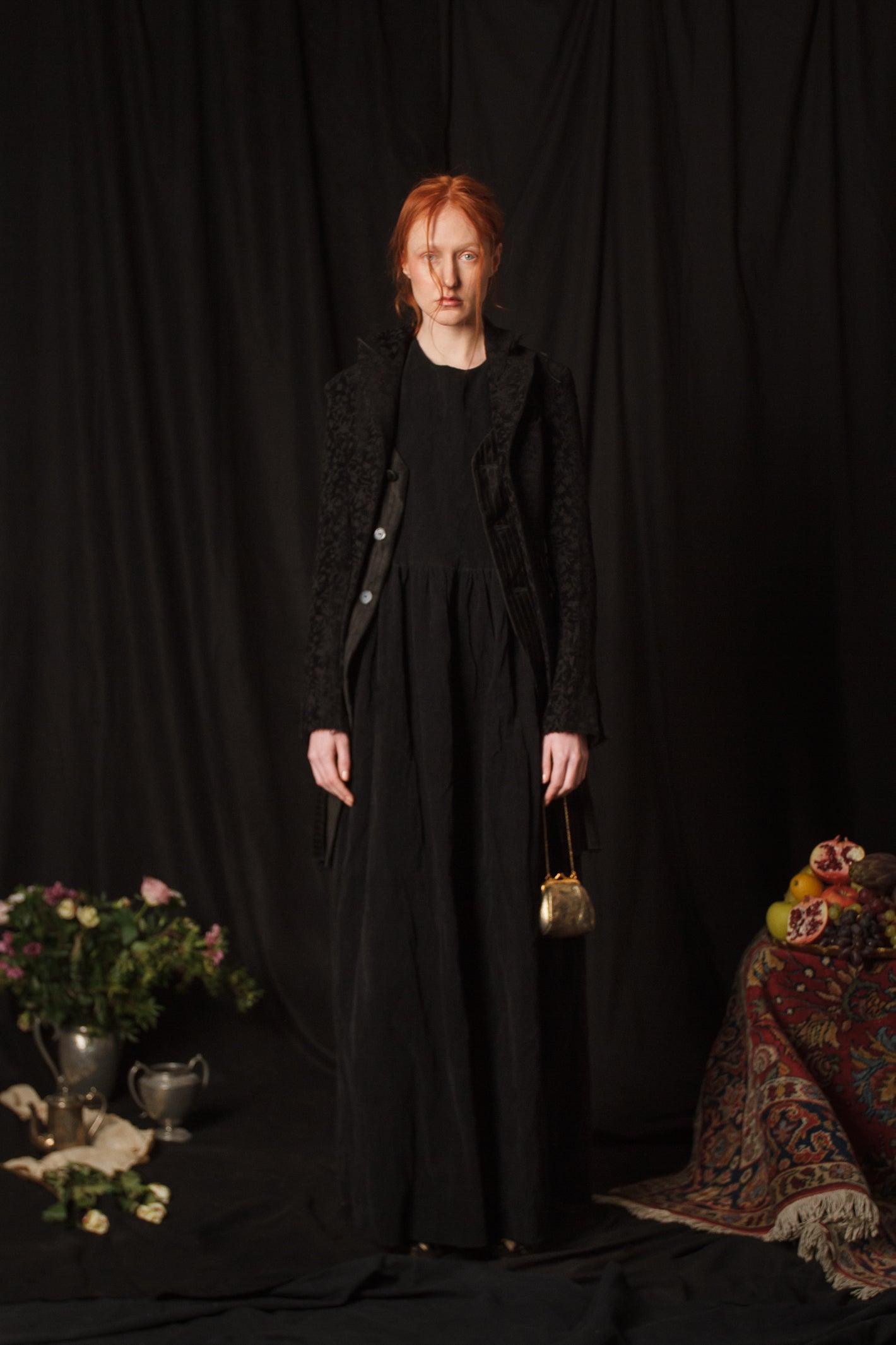 A Tentative Atelier AW18 Lookbook Womens black velvet embroidered coat and mini gold chain purse