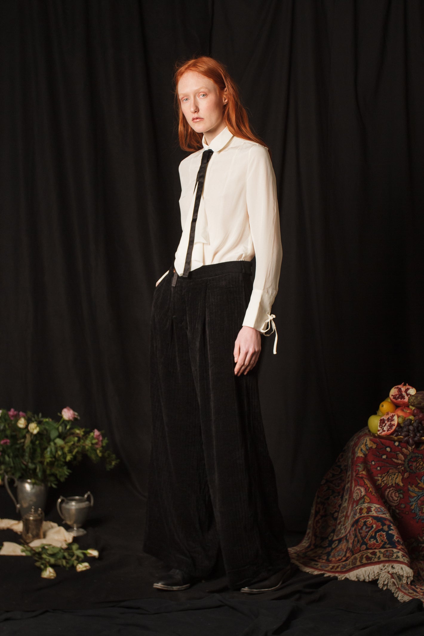 A Tentative Atelier AW18 Lookbook Womens white shirt blouse with black ribbon tie styled with black velvet trousers