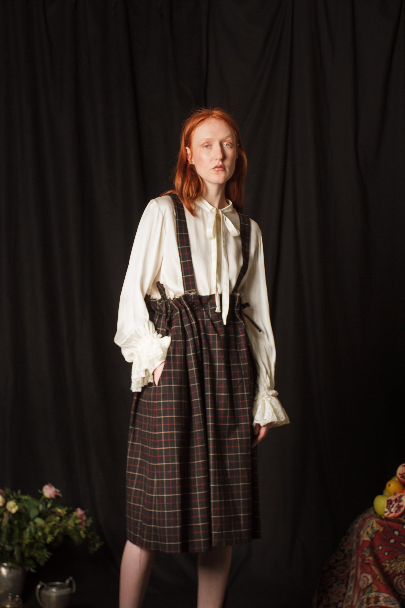 A Tentative Atelier AW18 Lookbook Womens crop of white shirt blouse paired with a tartan check suspenders skirt