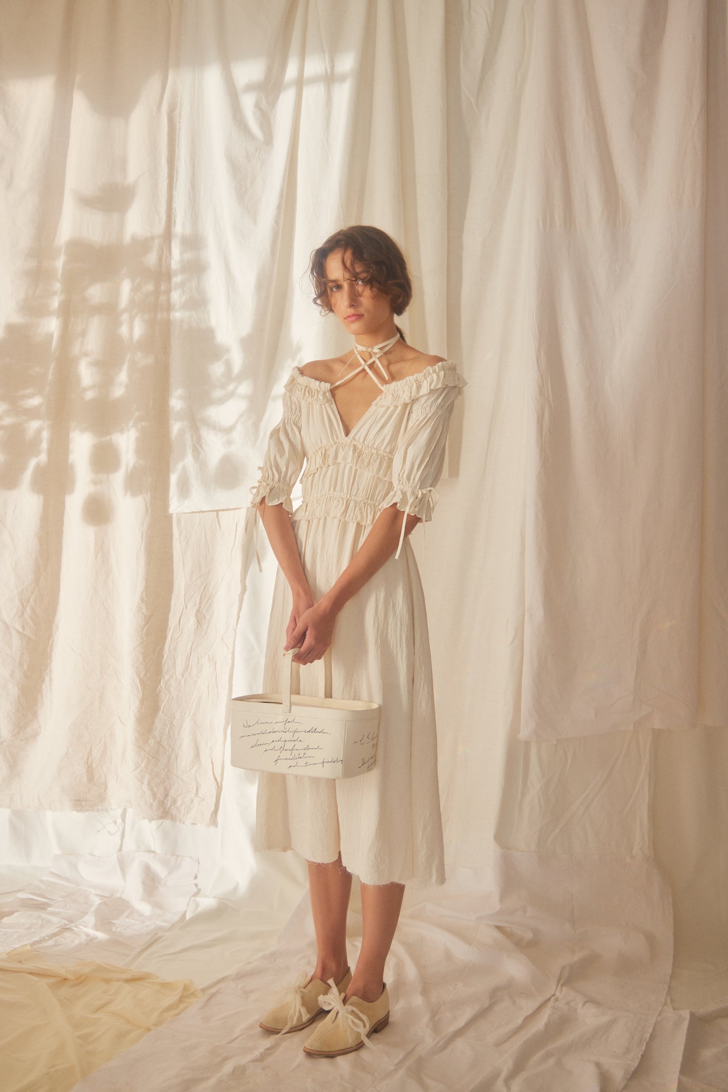 A Tentative Atelier SS22 Lookbook white ruffled top midi dress