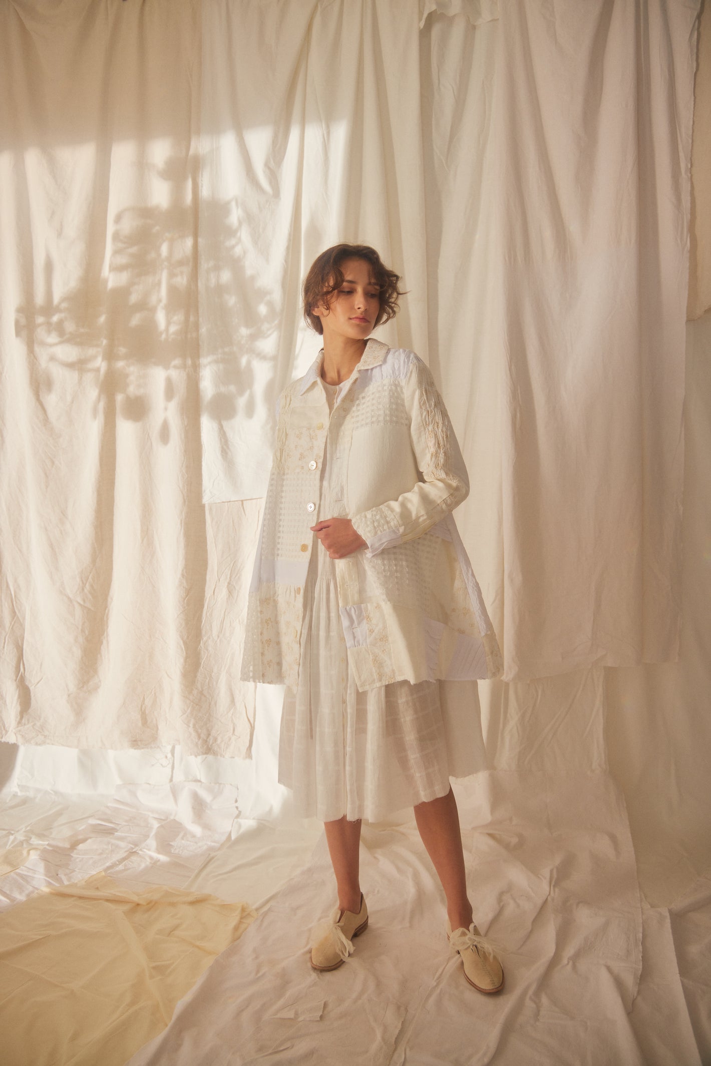 A Tentative Atelier SS22 Lookbook cream patchwork coat and white midi dress