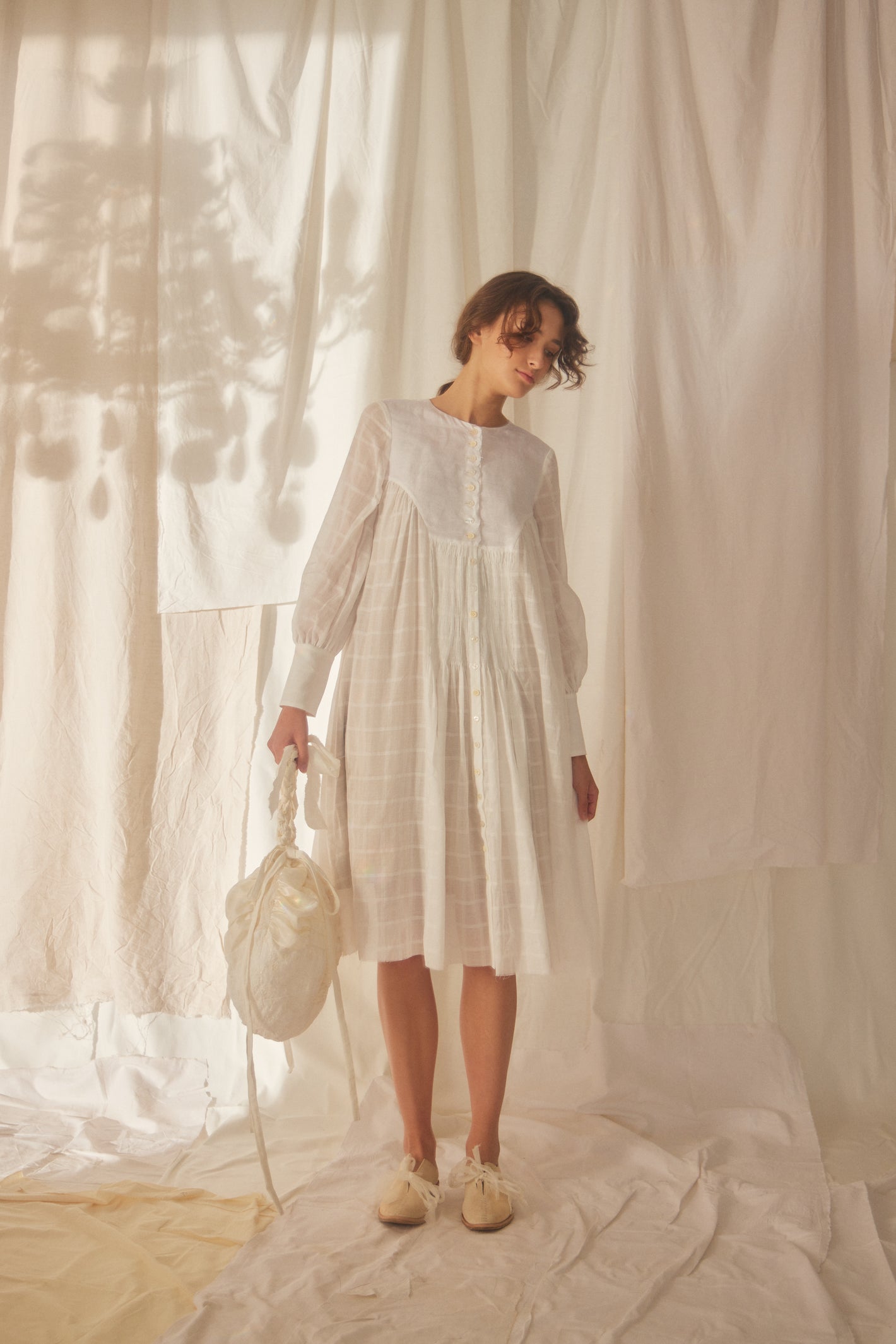 A Tentative Atelier SS22 Lookbook white checked button up midi dress