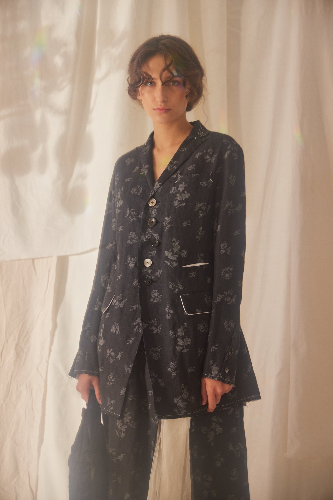 A Tentative Atelier SS22 Lookbook crop of floral print buttoned jacket