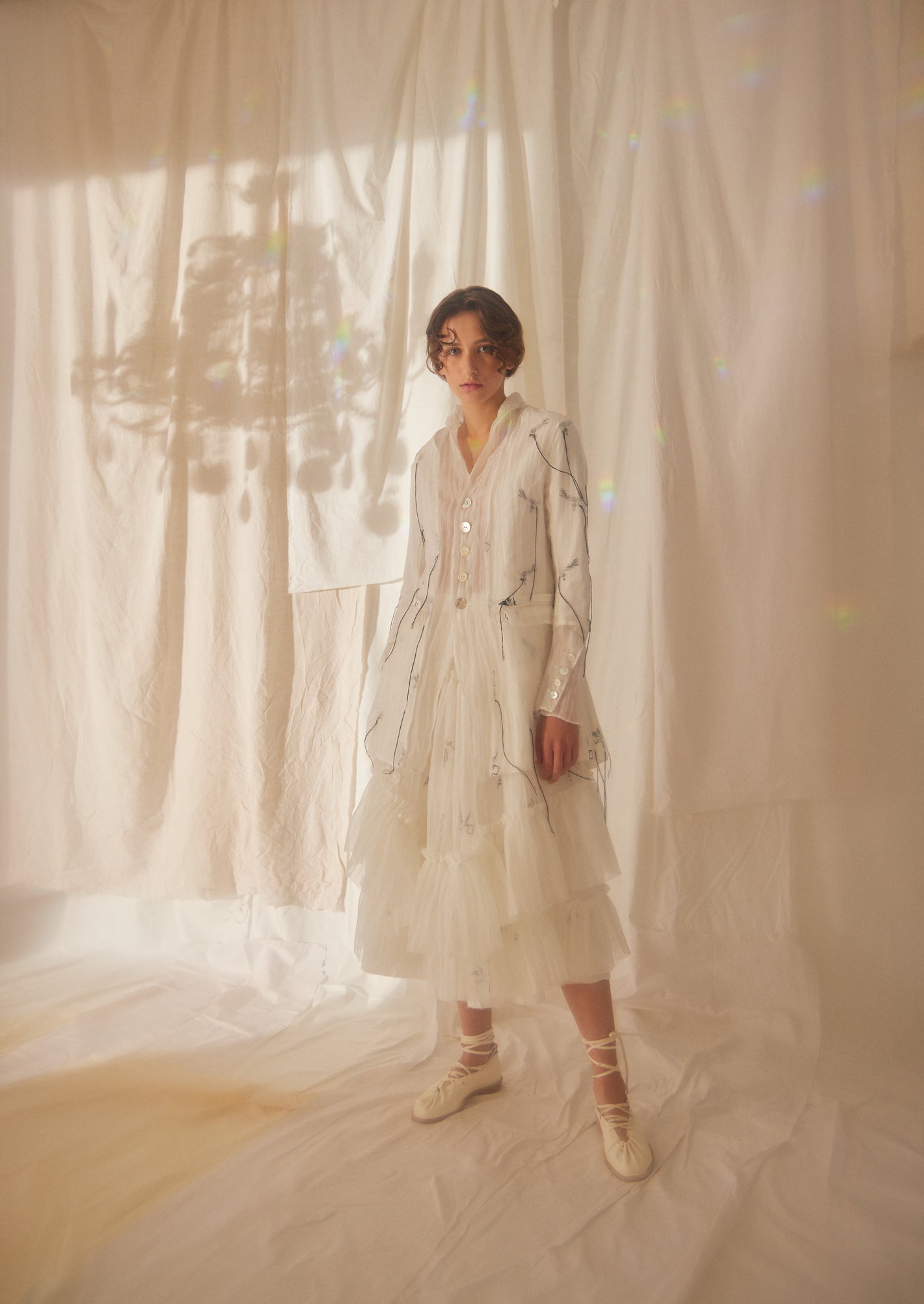 A Tentative Atelier SS22 Lookbook white embroidered semi sheer long coat