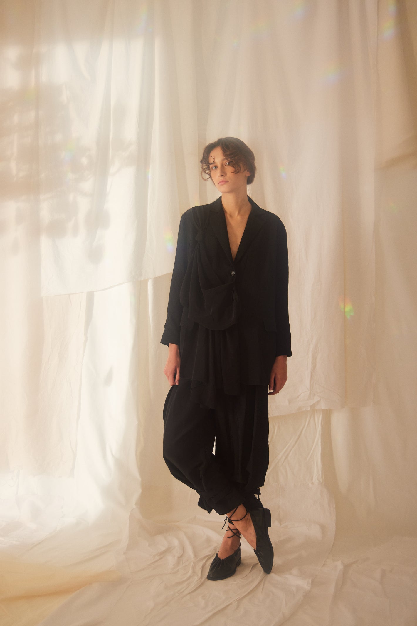 A Tentative Atelier SS22 Lookbook black jacket and trousers