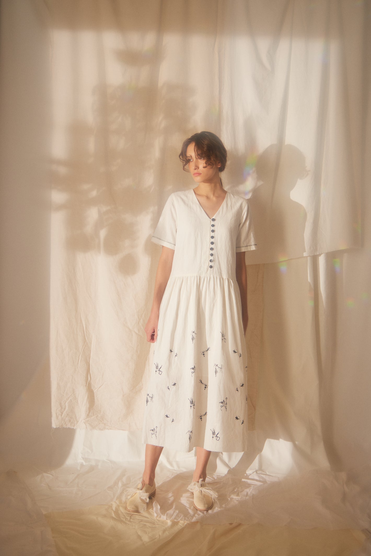 A Tentative Atelier SS22 Lookbook white embroidered short sleeve dress dress