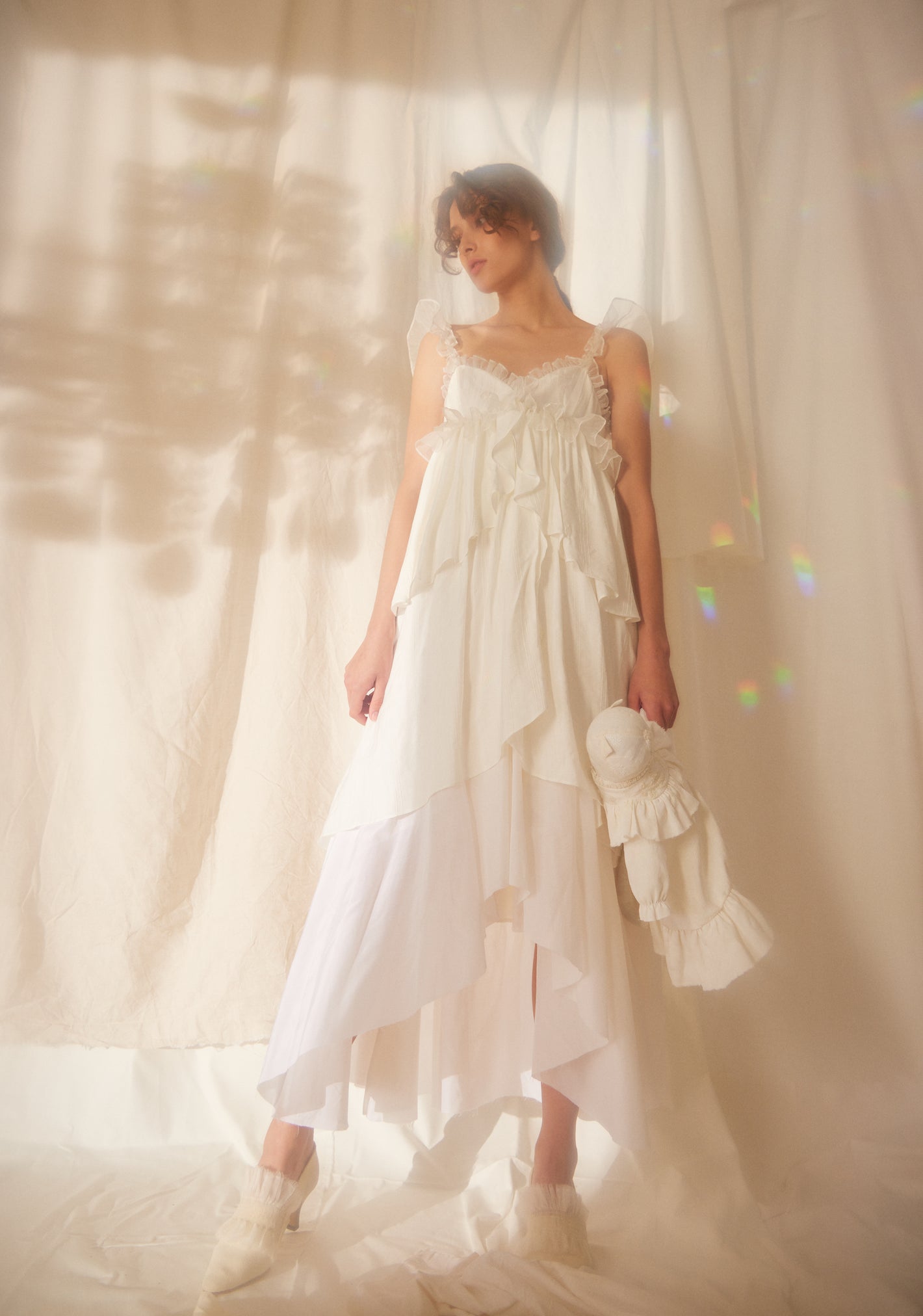 A Tentative Atelier SS22 Lookbook white multi tiered sleeveless white dress