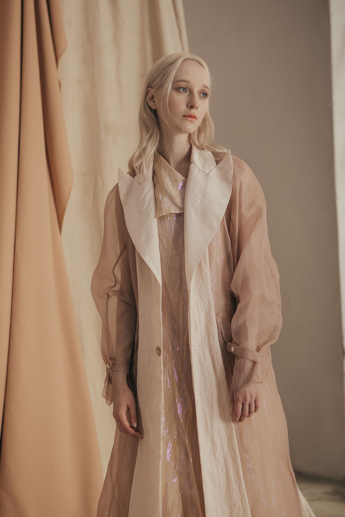 A Tentative Atelier SS20 Lookbook Womens crop of nude and white semi sheer coat