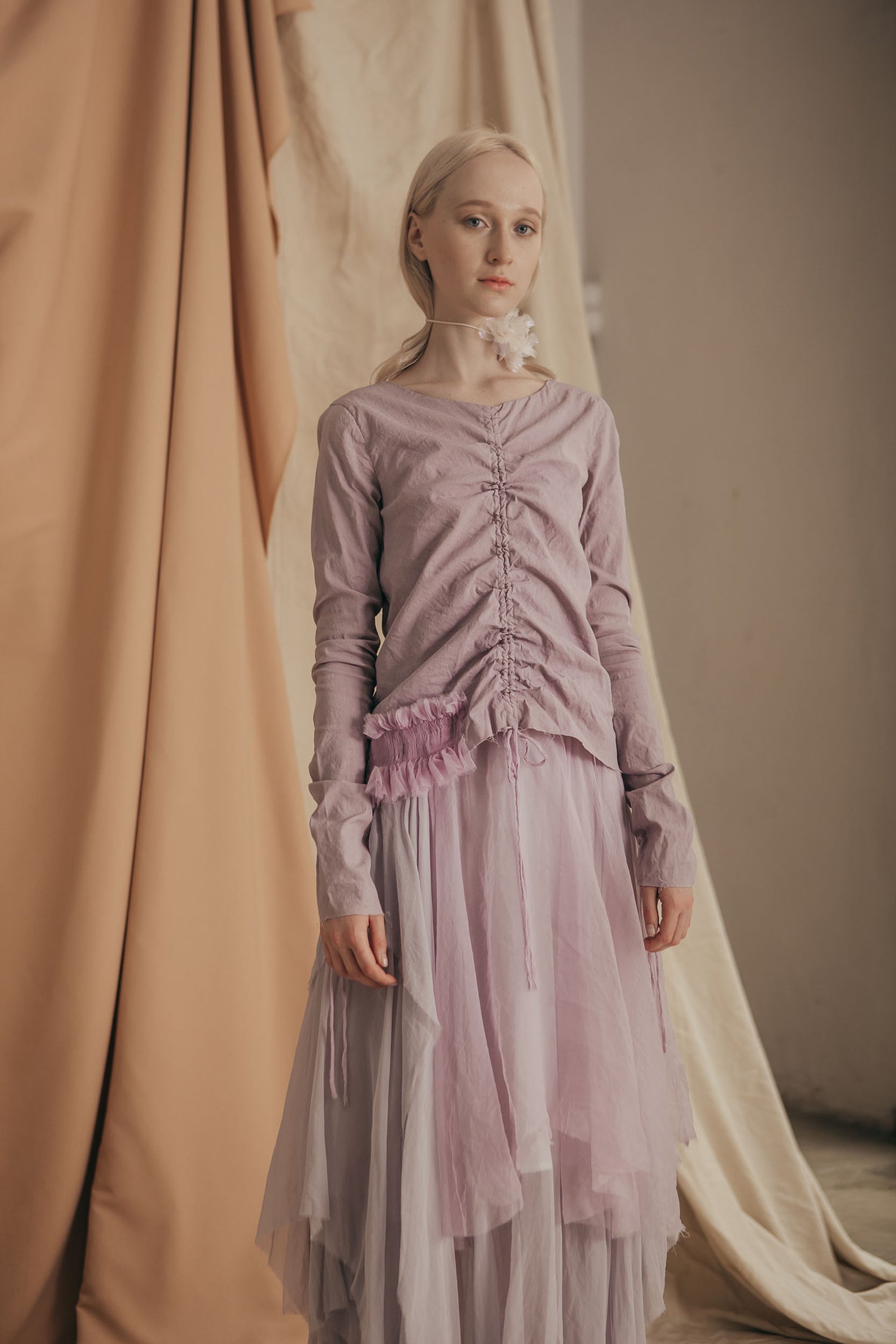 A Tentative Atelier SS20 Lookbook Womens lavender dress featuring a centrally ruched top with smocked appliqué and a ballerina skirt