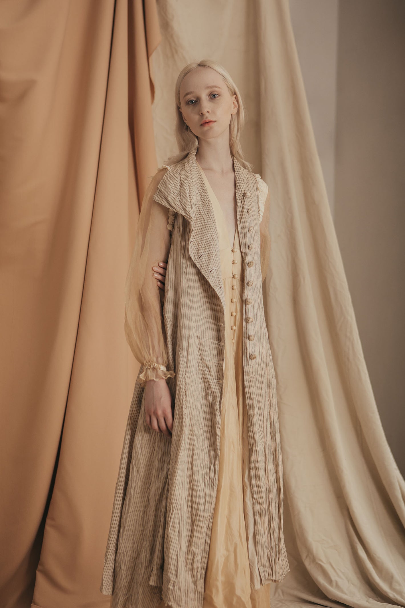 A Tentative Atelier SS20 Lookbook Womens crop of crinkle brown striped sleeveless coat