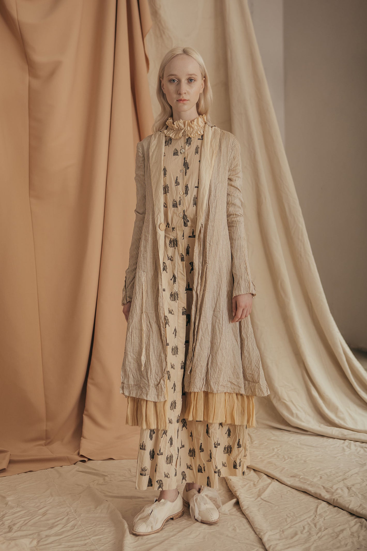 A Tentative Atelier SS20 Lookbook Womens crinkle brown striped coat and brown printed ruffle collar dress