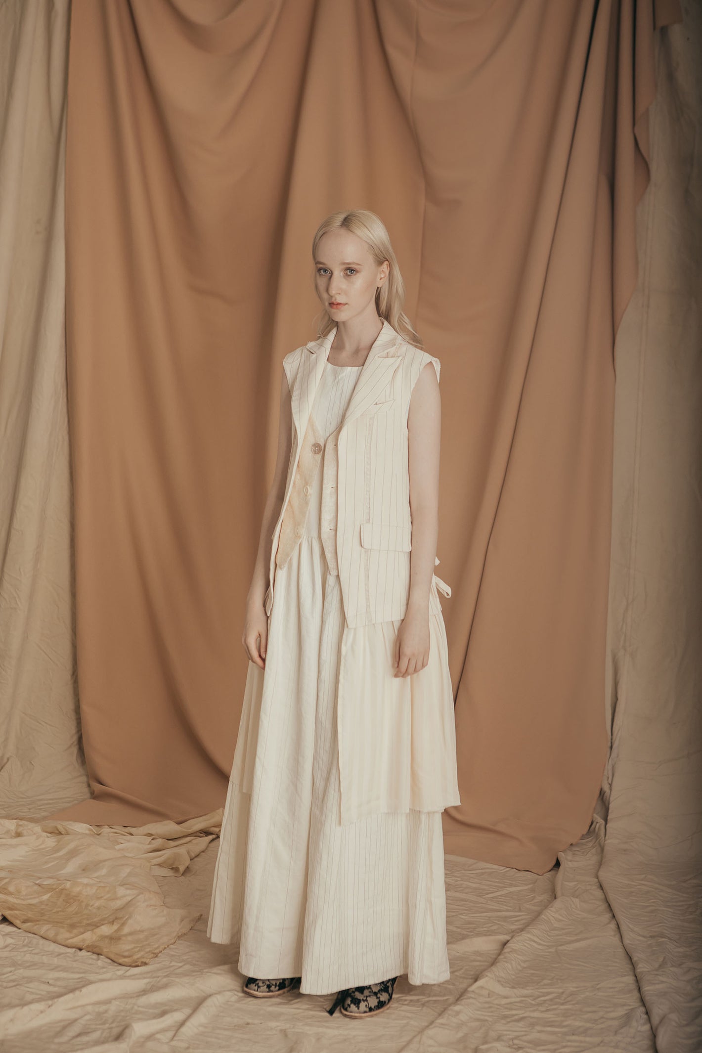 A Tentative Atelier SS20 Lookbook Womens white striped sleeveless coat, waistcoat and dress