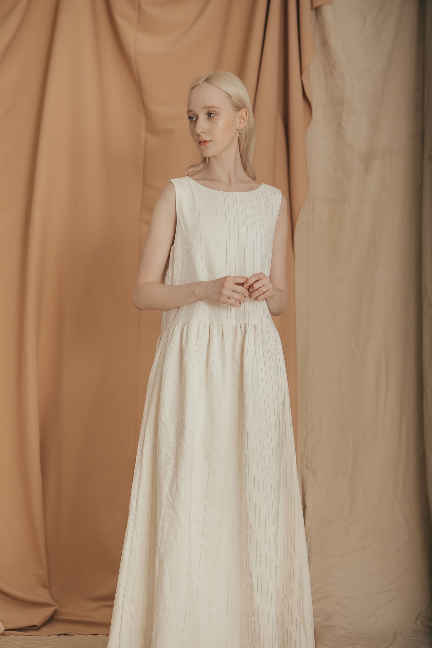 A Tentative Atelier SS20 Lookbook Womens crop of white striped sleeveless dress