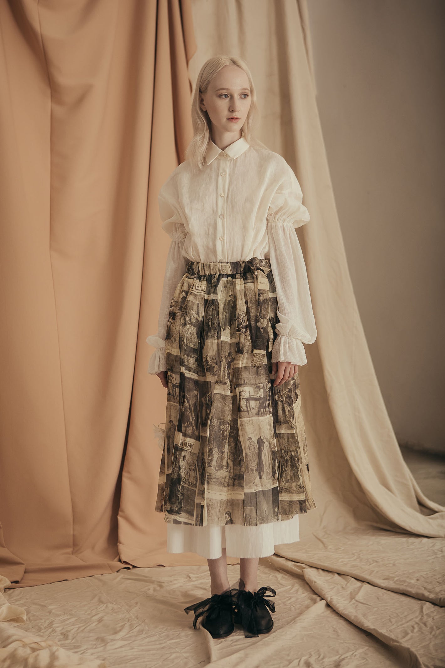 A Tentative Atelier SS20 Lookbook Womens white gathered sleeves buttoned shirt and drawstring printed skirt