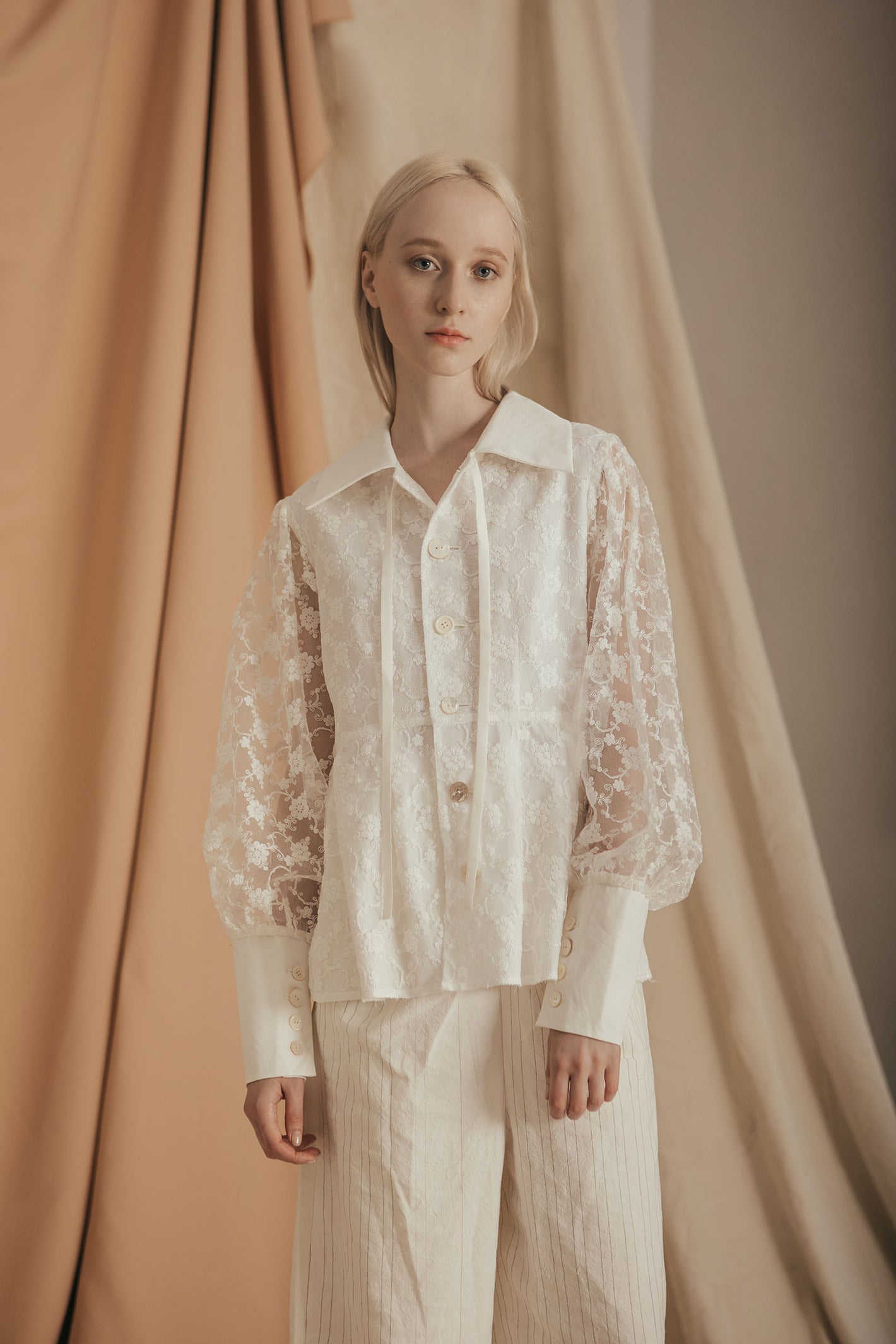 A Tentative Atelier SS20 Lookbook Womens crop of white lace top with shirt cuffs 