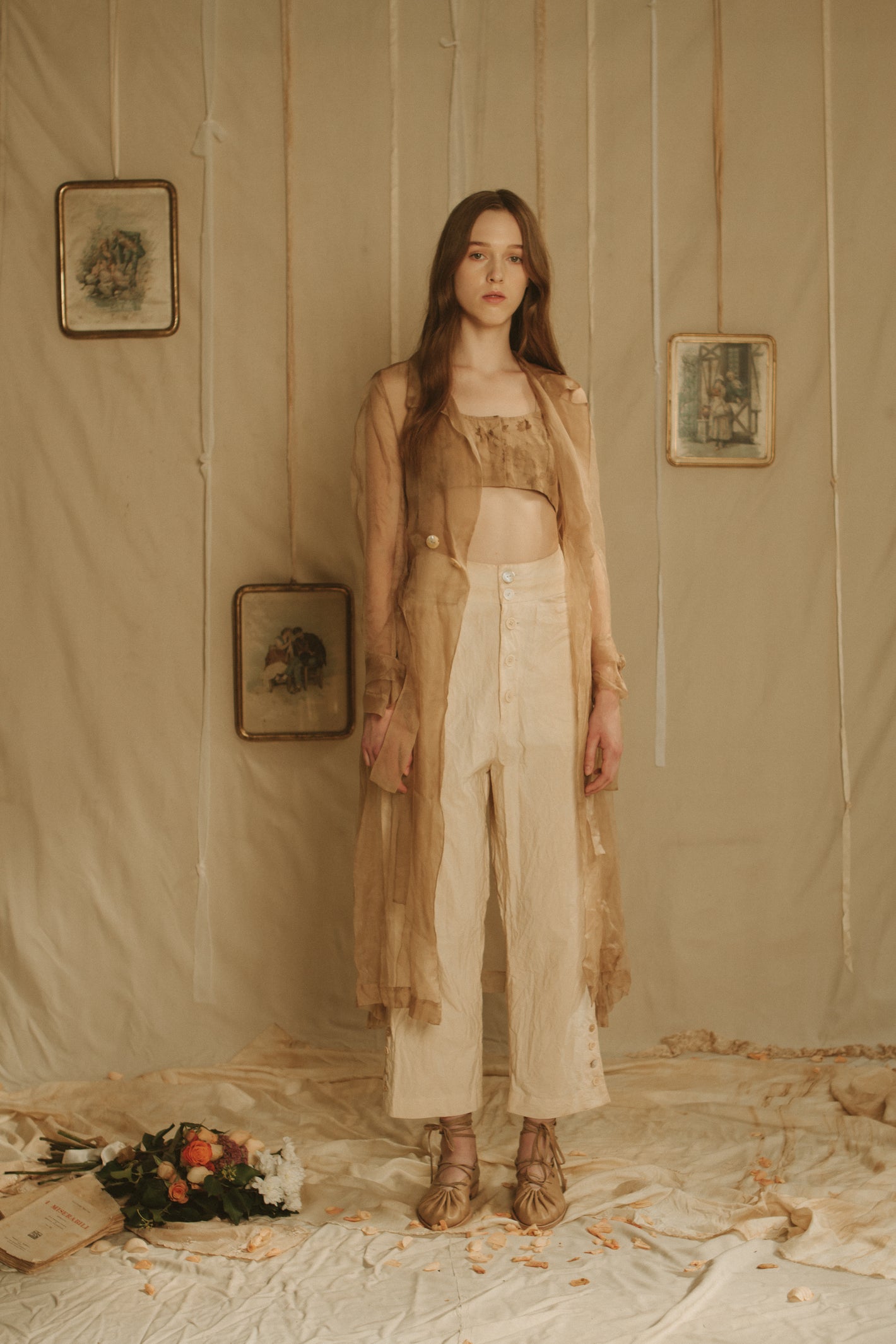 A Tentative Atelier SS19 Lookbook Womens brown sheer coat, bandeau top and high waist cream trousers