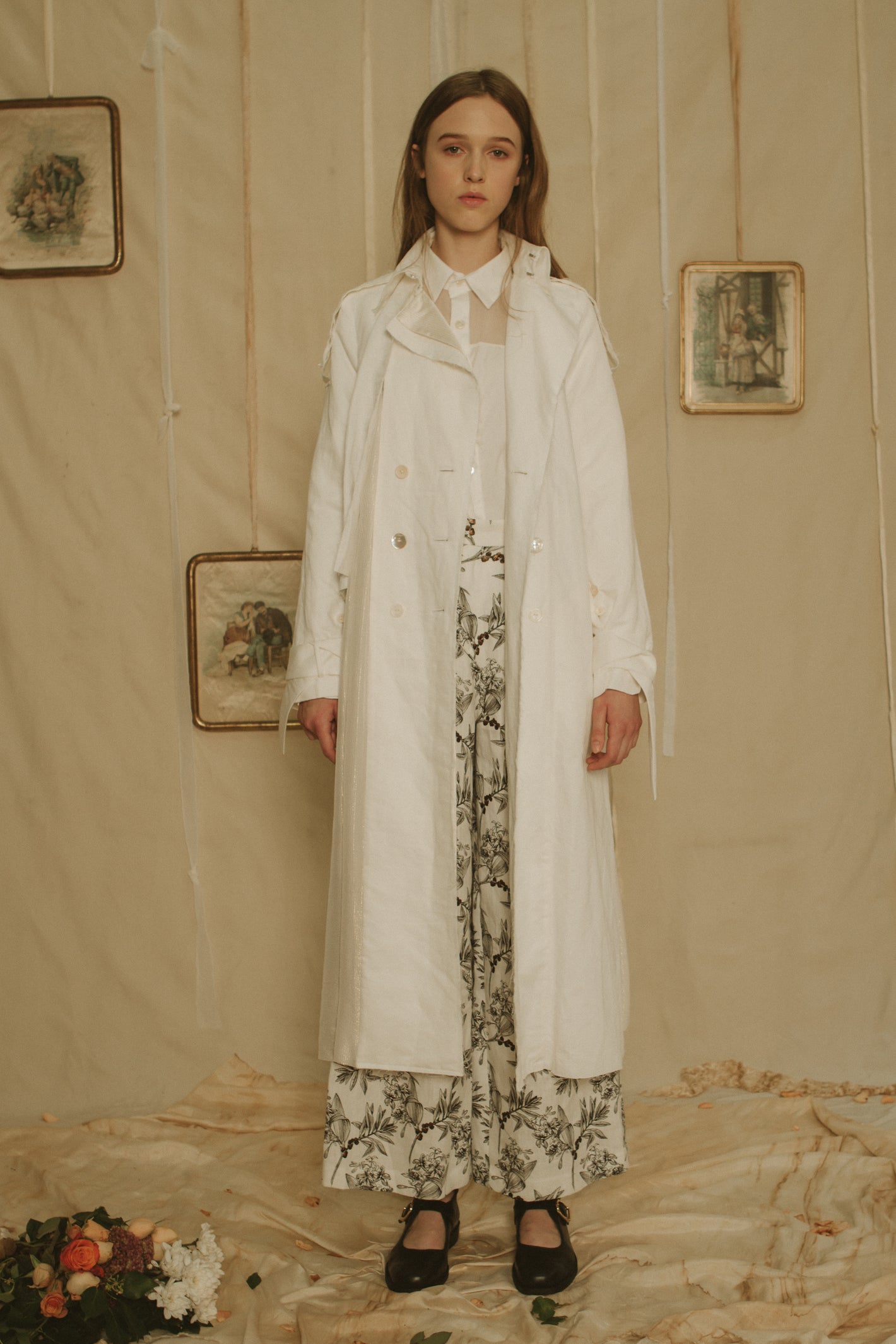 A Tentative Atelier SS19 Lookbook Womens white coat and printed trousers