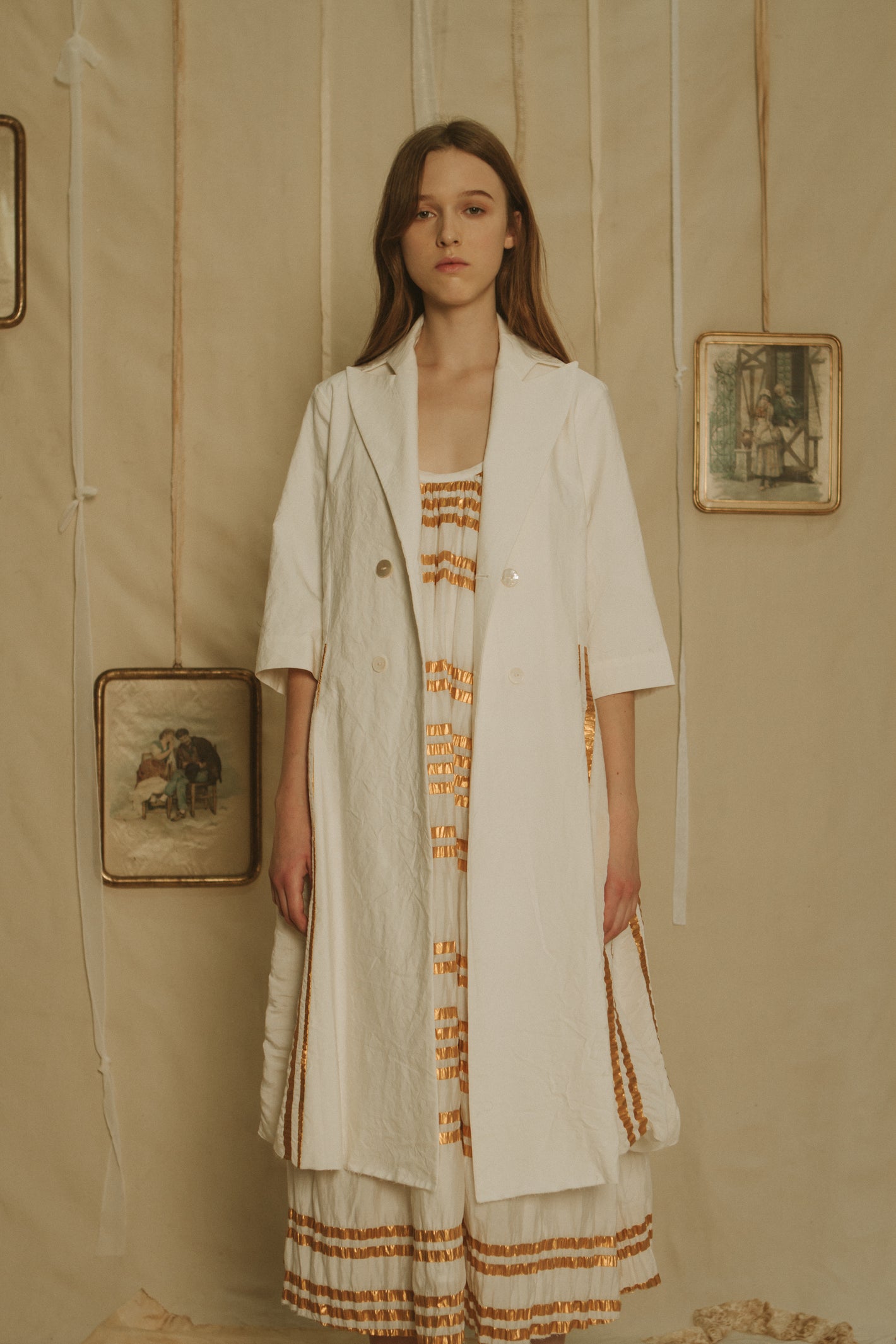 A Tentative Atelier SS19 Lookbook Womens crop of white coat with half length sleeves