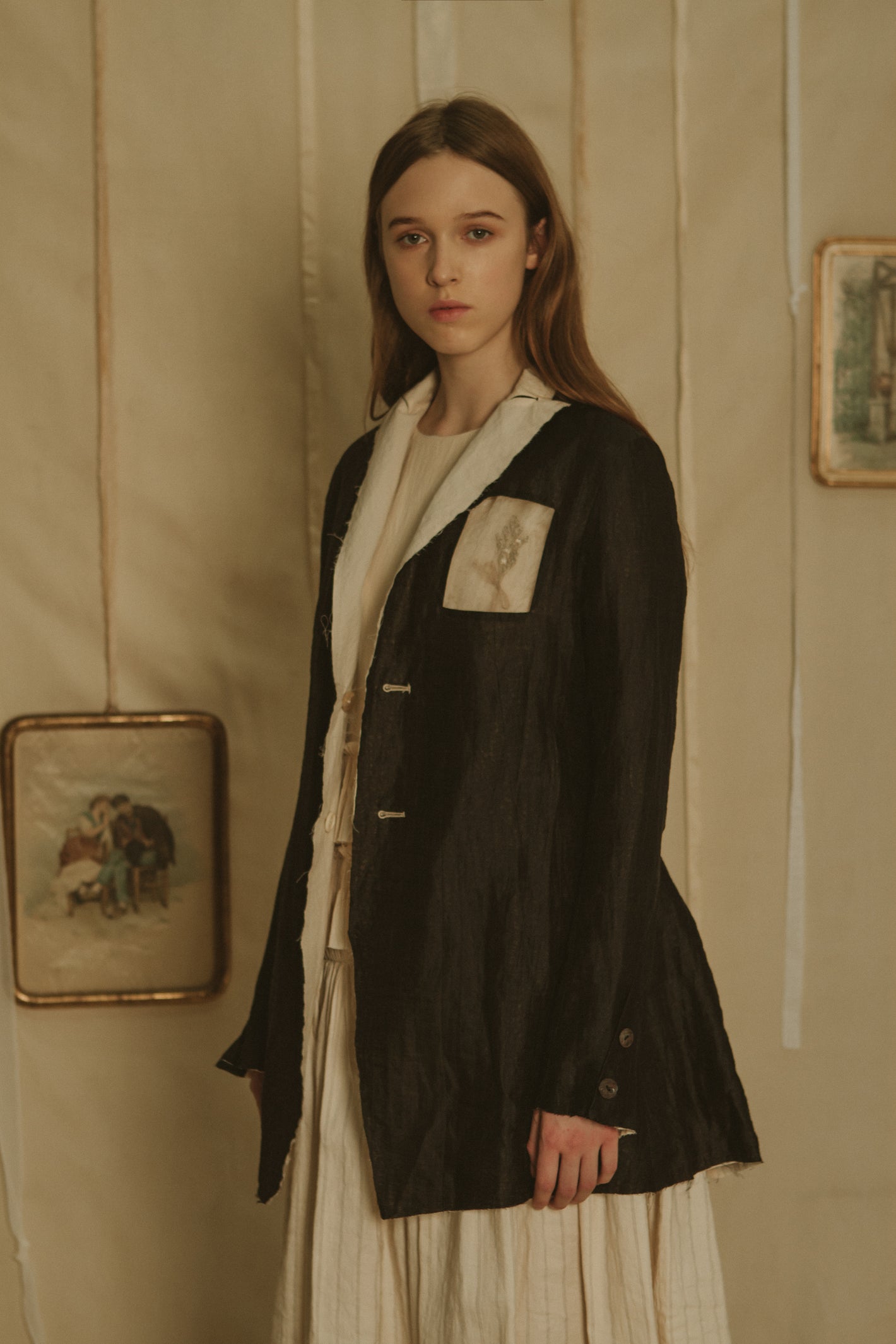 A Tentative Atelier SS19 Lookbook Womens crop of black jacket with contrasting white lapels and patch chest pocket