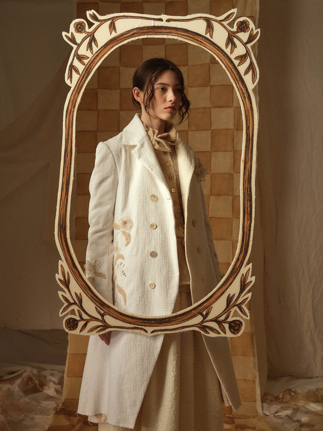 A Tentative Atelier AW21 Lookbook Womens crop of womens textured white coat