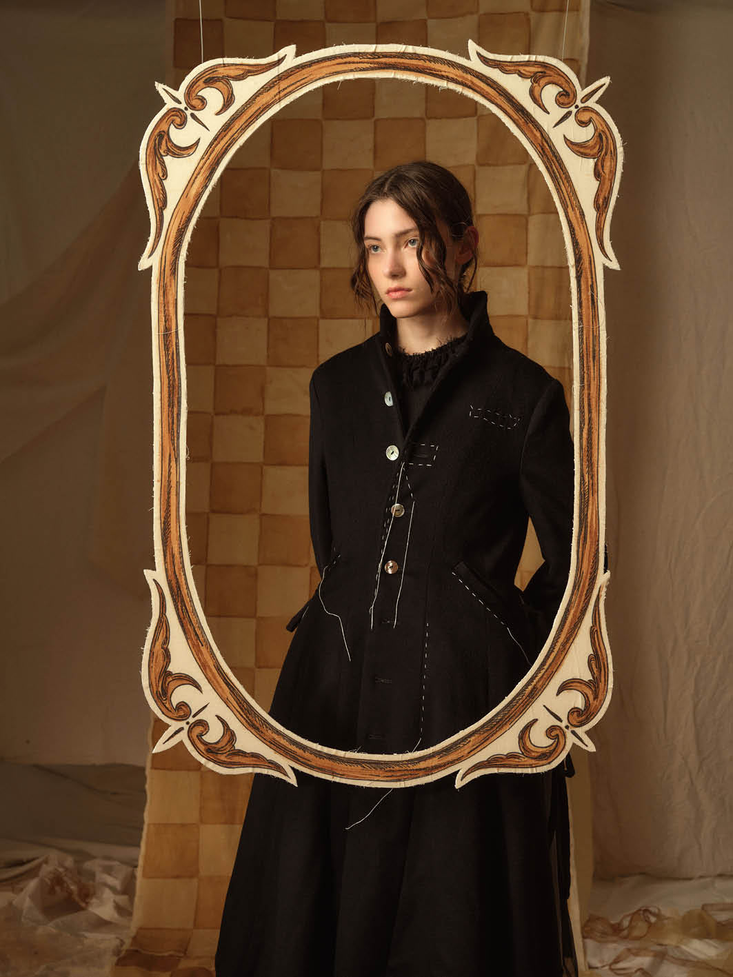 A Tentative Atelier AW21 Lookbook Womens crop of black coat with white embroidery
