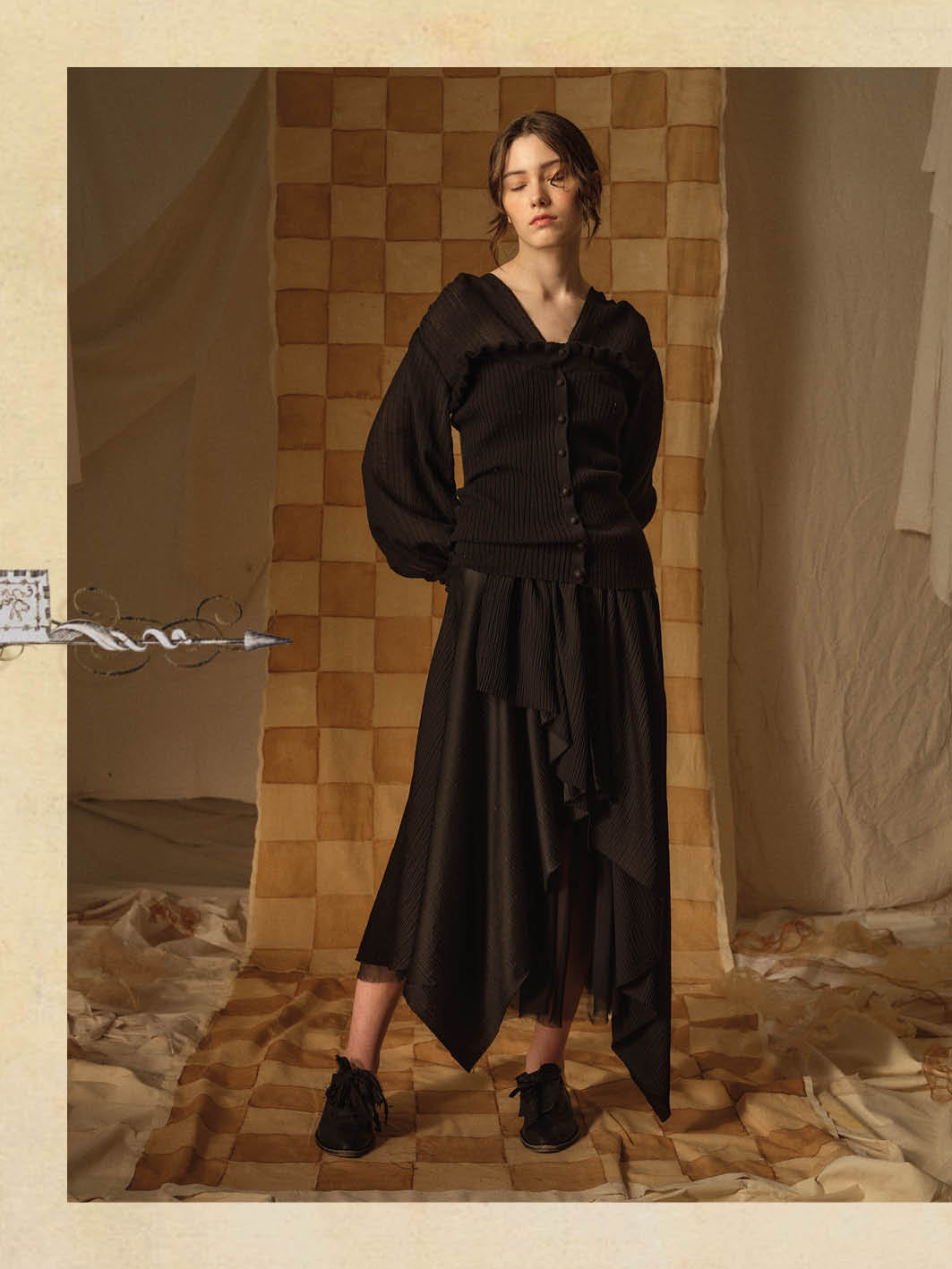 A Tentative Atelier AW21 Lookbook Womens black sheer sleeves cardigan and black multi layered skirt 