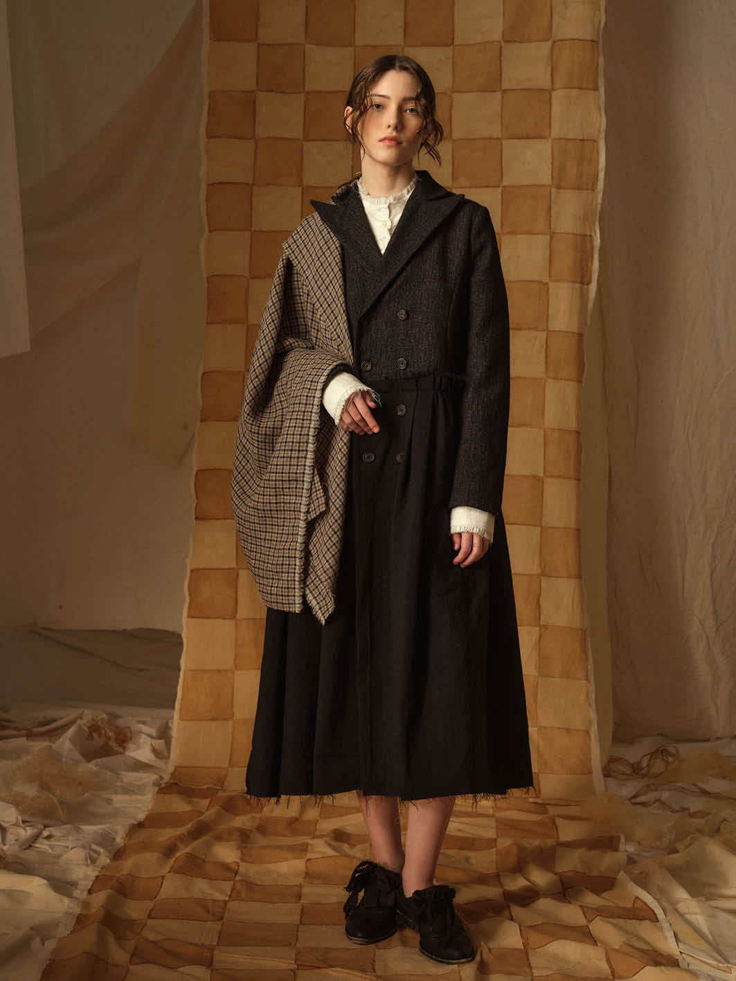 A Tentative Atelier AW21 Lookbook Womens black textured coat with checked draped fabric